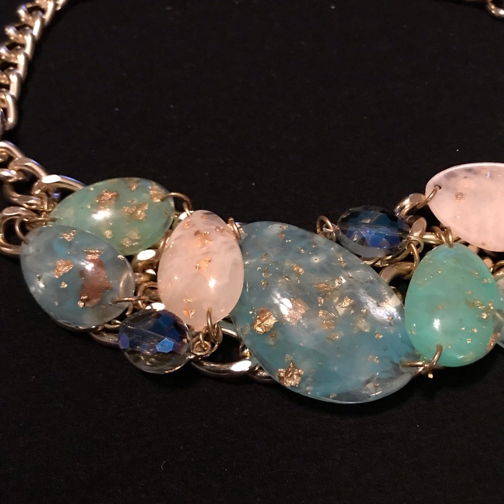 Statement piece beaded necklace. Note the change in chain in the back